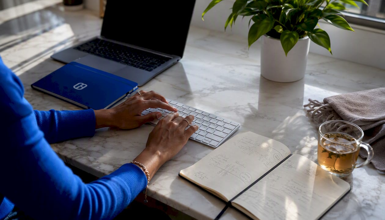 Hands entering payment data on keyboard